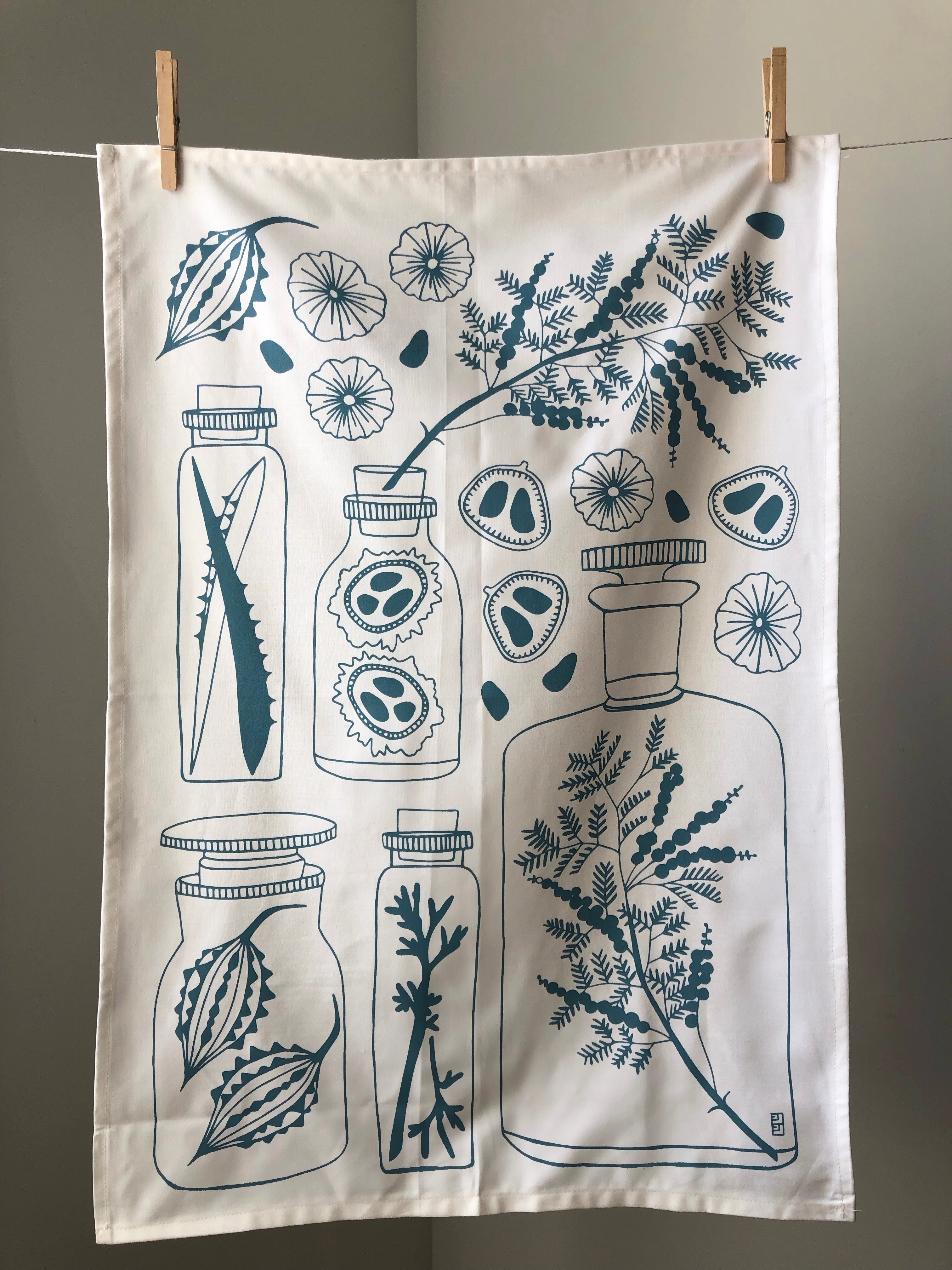 Cotton Tea Towel with herb and jar print.