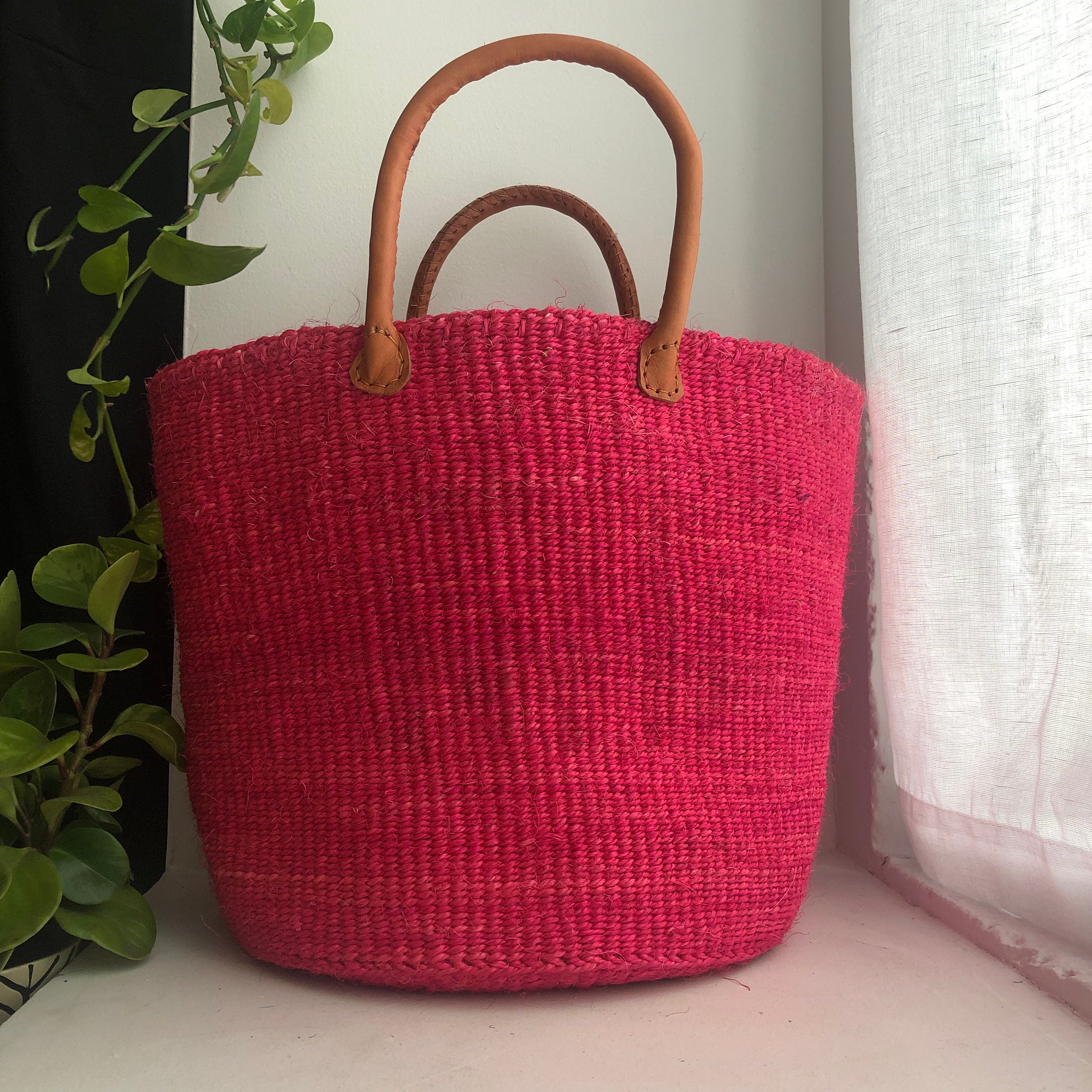 hot pink basket with leather handles