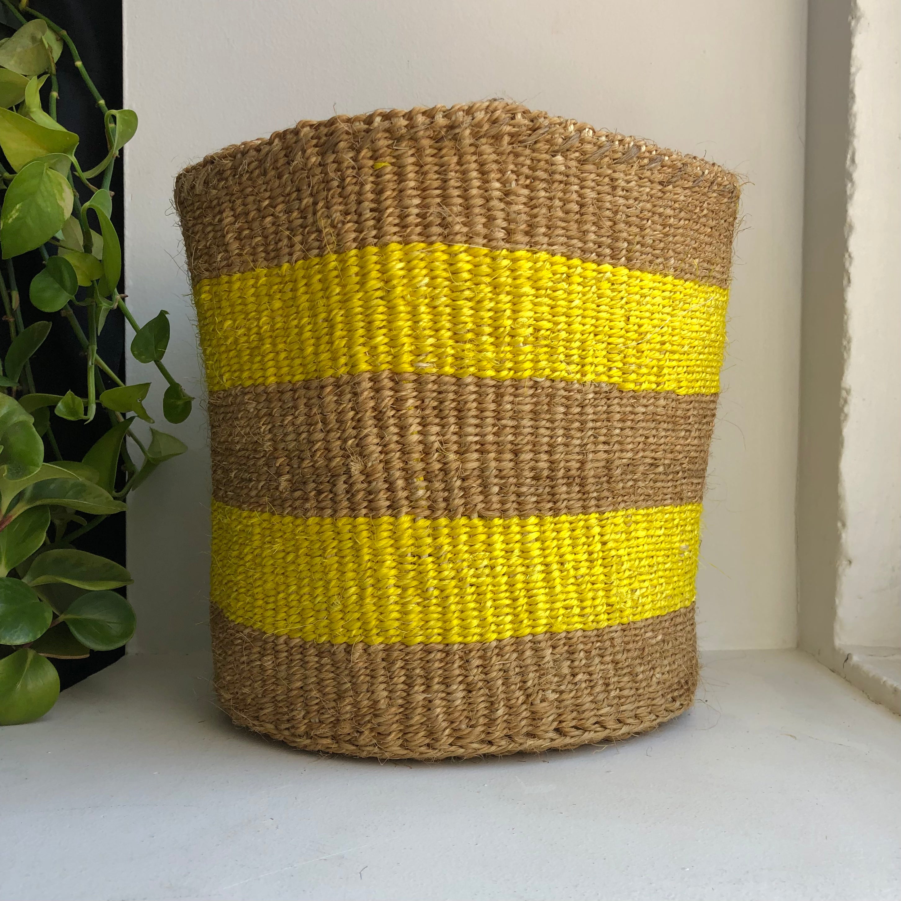 10" woven sisal basket with yellow tripes