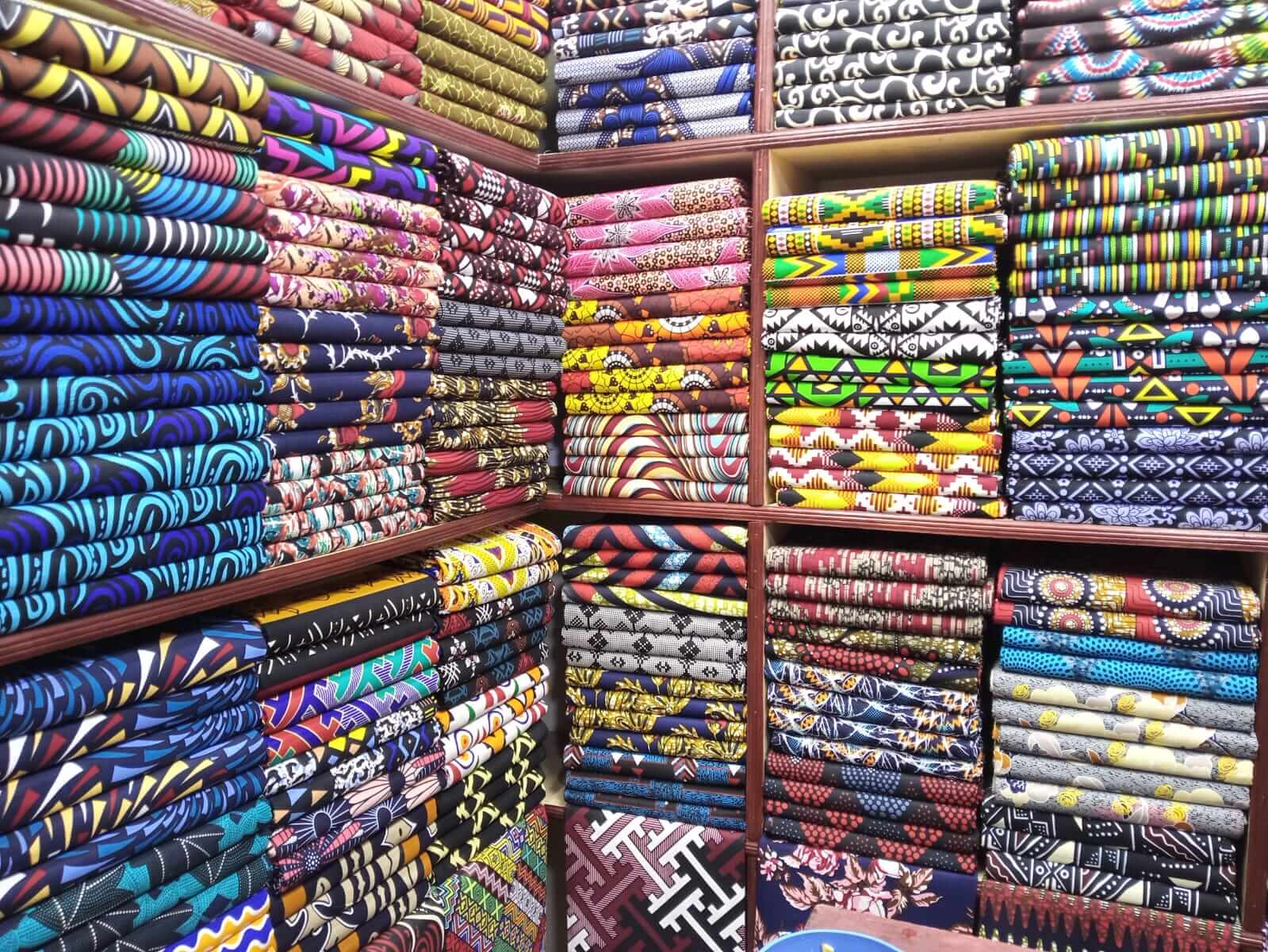 Market photo of stacks of fabric