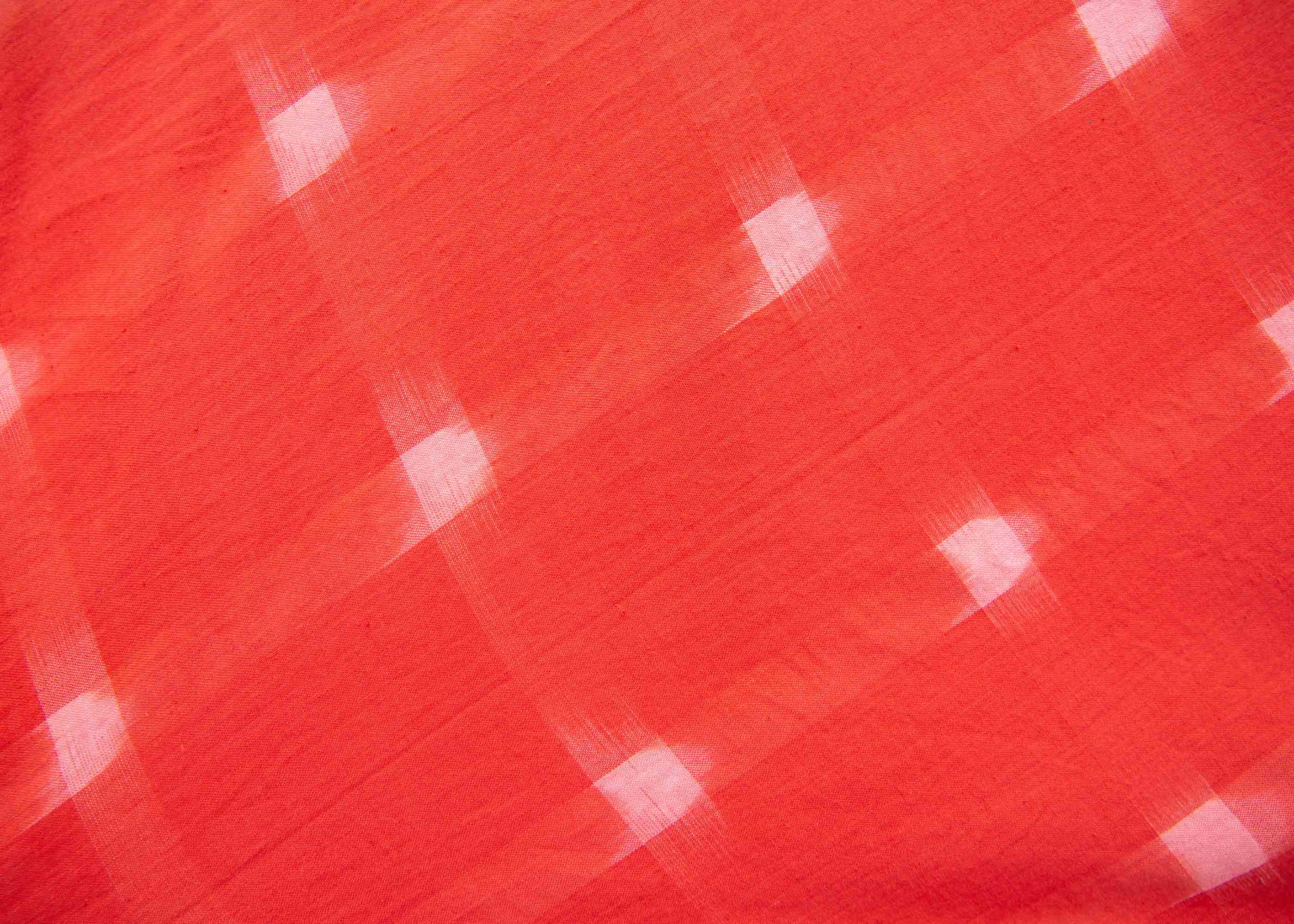 display of a red ikat dress