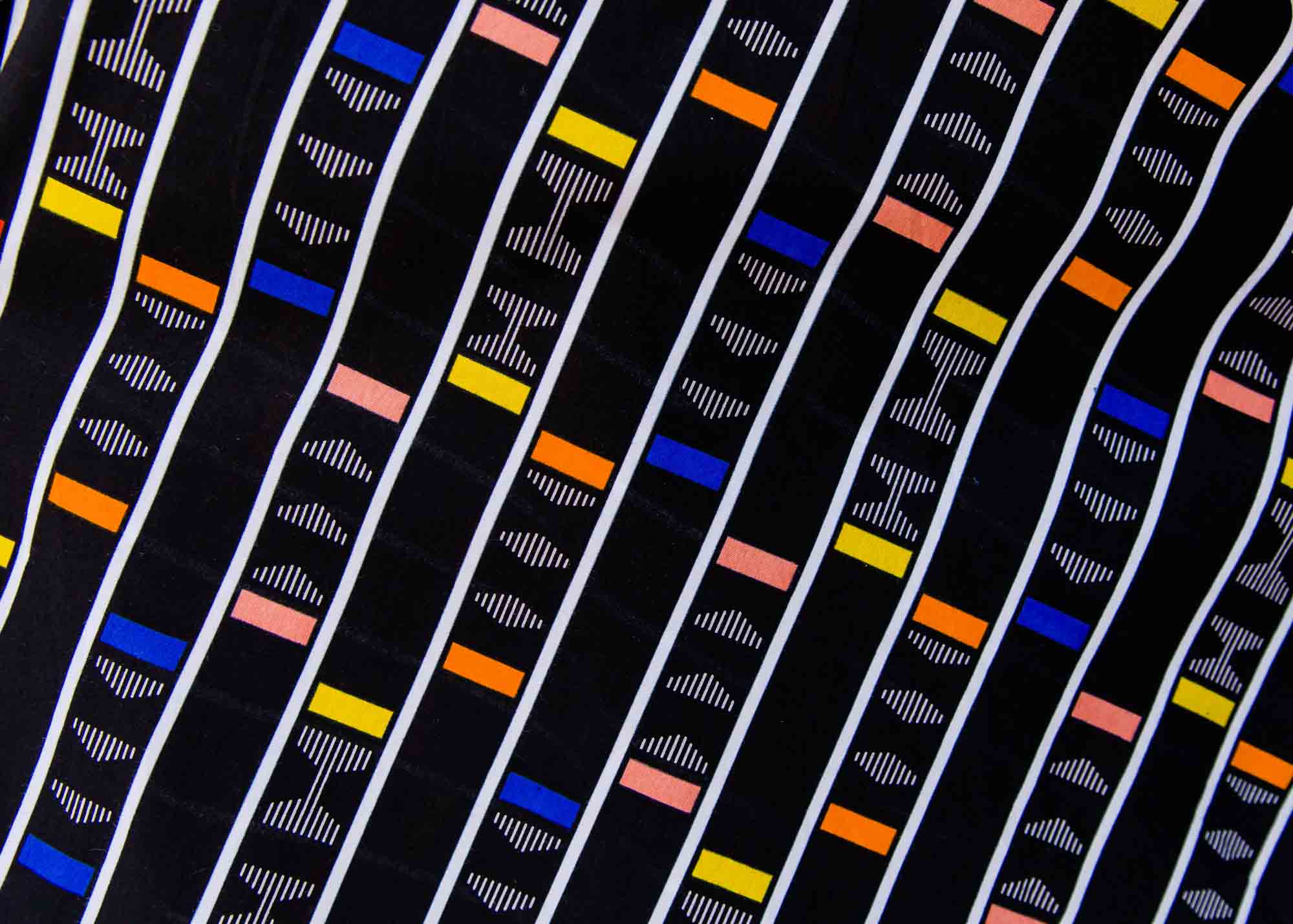 display of a multicolored and black striped dress