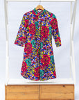 Display of rainbow print dress.