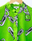Lime green shirt with locket charms