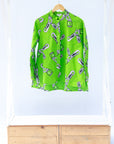 Lime green shirt with locket charms